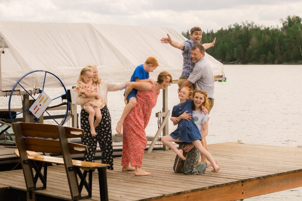 candid family photos summer lake edmonton